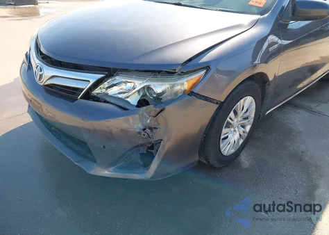 2014 Toyota Camry Hybrid Le z USA, uszkodzony, nr VIN 4T1BD1FK0EU128567